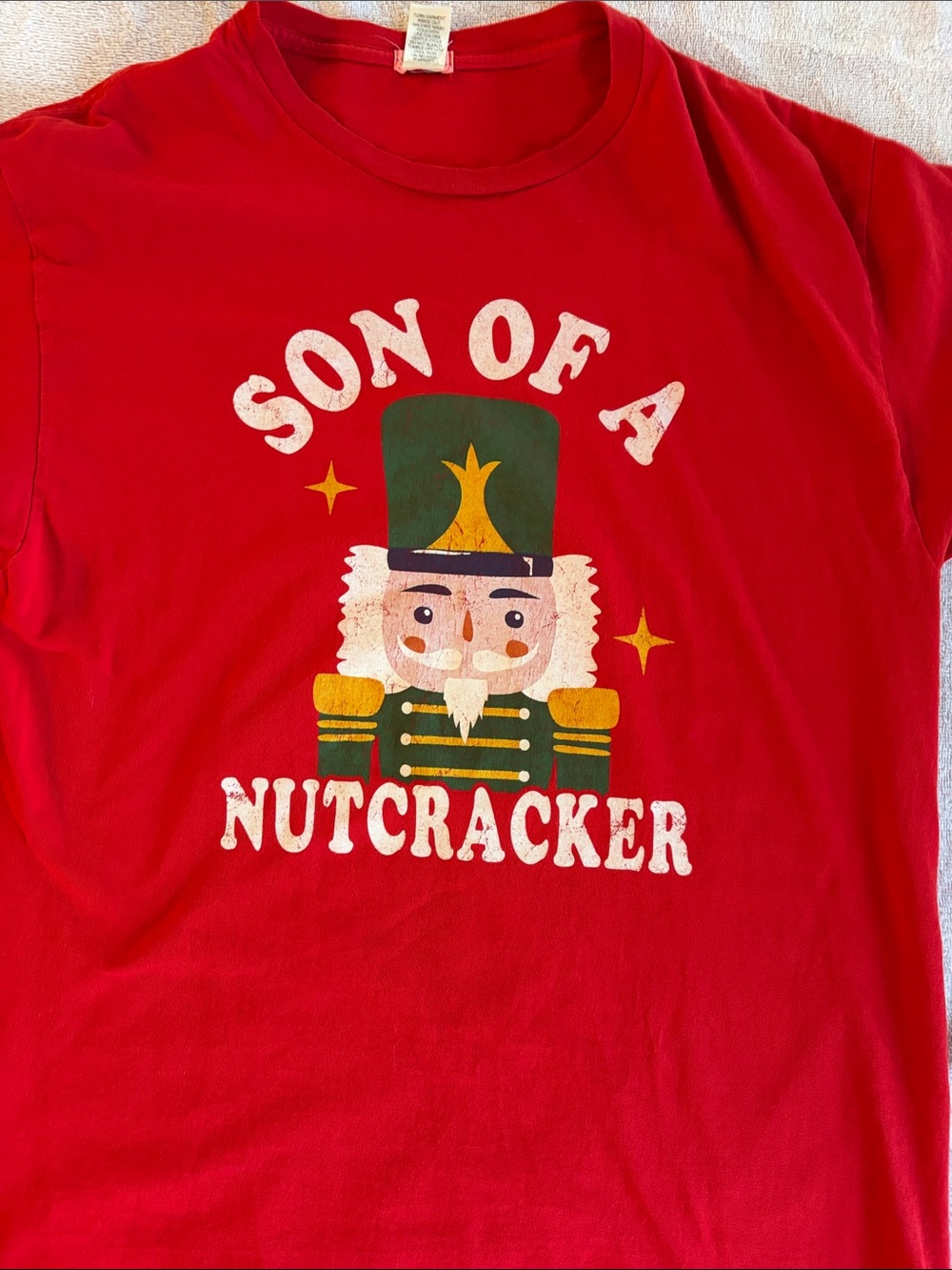 Red "Son of a Nutcracker" Nutcracker Graphic Tee. Runs big